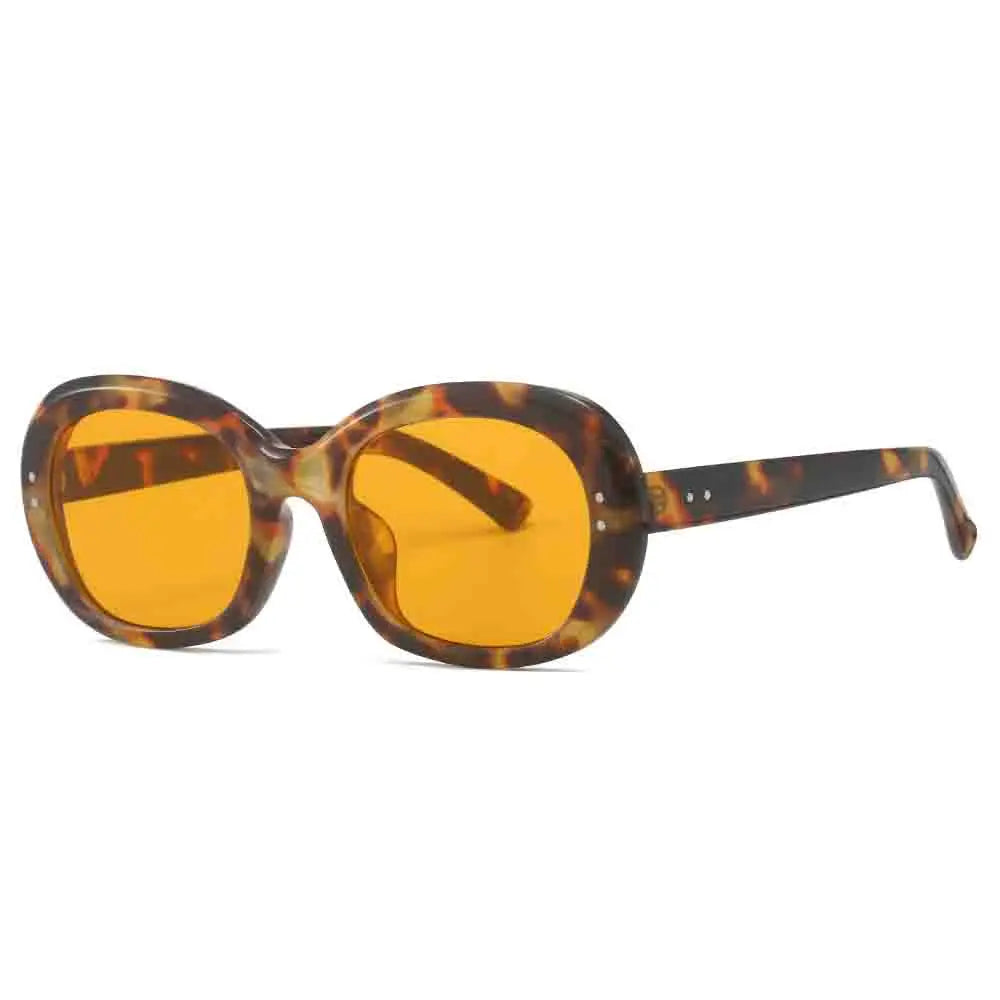 Grosse lunette de soleil ronde femme Tacheté